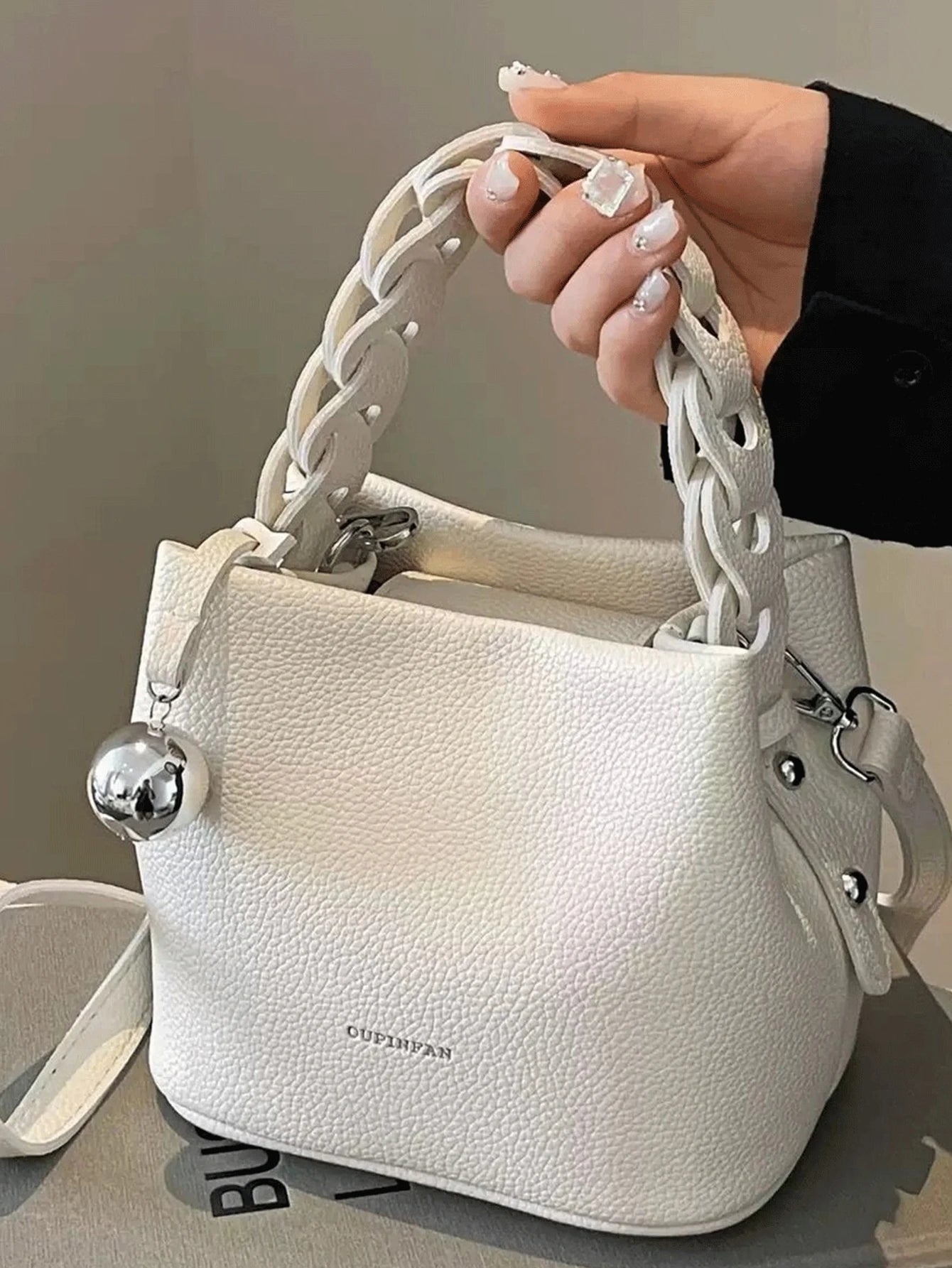 Fashion Joker pu waterproof fabric, letter pattern design, metal pendant decoration design portable square bag, preparation of p