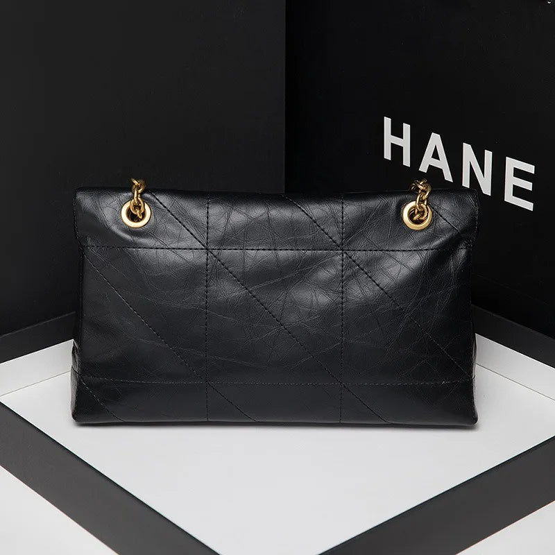 New Xiaoxiangfeng Ling grid chain genuine leather Ling grid bag armpit diagonal cross bag